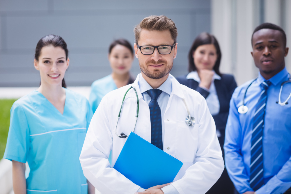 team-doctors-standing-together-hospital-premises